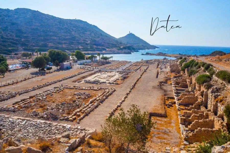 ancient ruins of knidos in datça with blue sea and rolling hills in the backgroun
