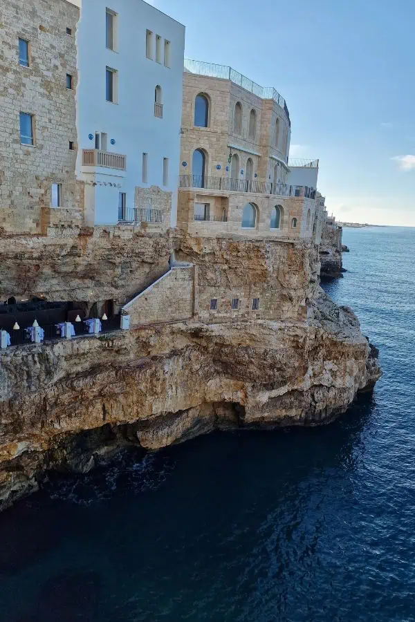 cave seaside restaurant cliff grotta palazzese poilgnano a mae puglia culture italy