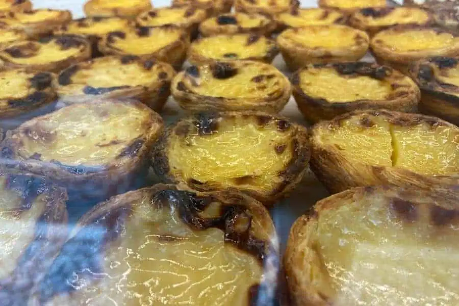 cook pastel de nata lisbon portugal 