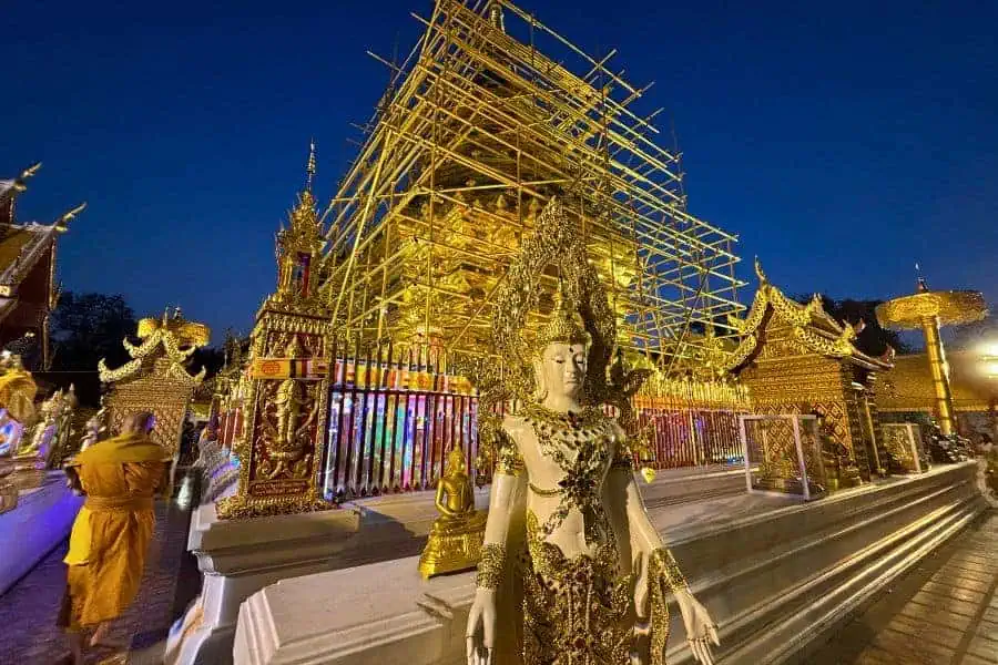 under renovation gold chedi or pagoda housing a holy relic at wat phra that doi suthep in chiang mai