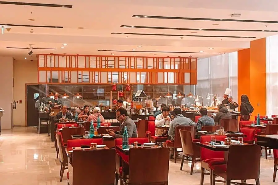 kava restaurant at fairfield by marriott lucknow with open kitchen and dining area