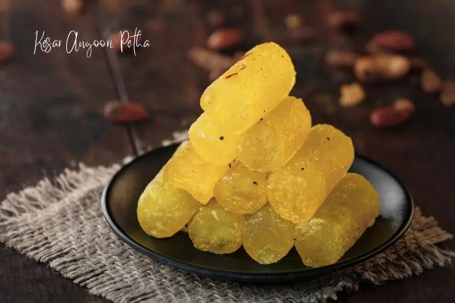kesar angoori petha from agra served on a black plate