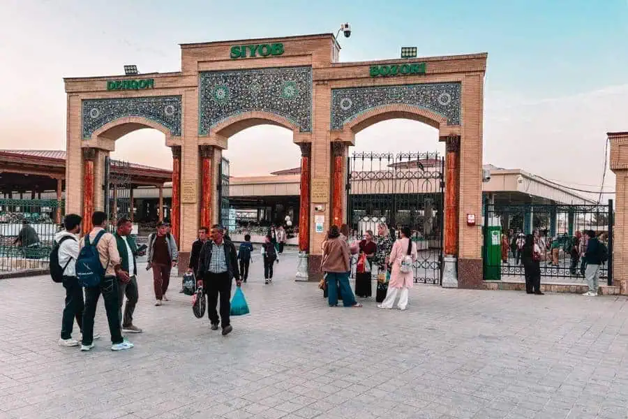 main gate of siab bazaar in samarkand with shoppers entering
