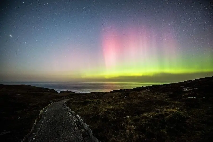 the aurora borealis in the night sky over malin head ireland