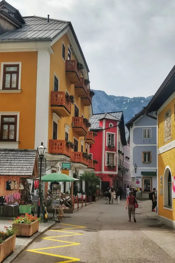 streets lined with colorful houses in Hallstatt Austria