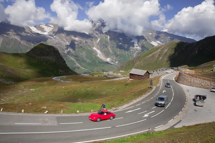 cars driving through hairpin bends of grossglockner high alpine road