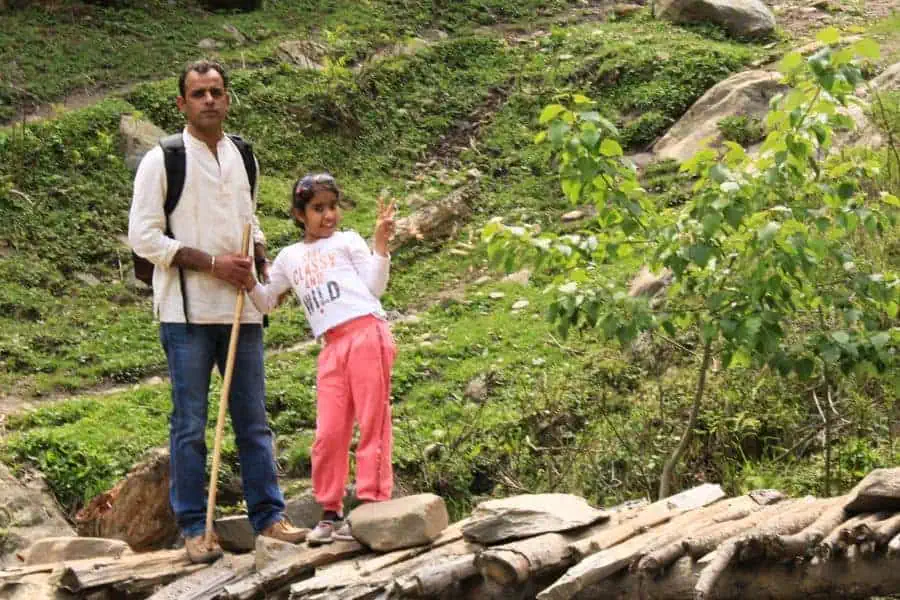 my little 8 year old daughter and hubby while trekking kheerganga in kasol
