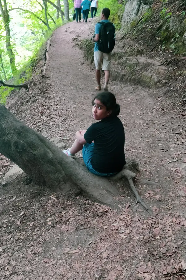mini-me taking rest from the hike at plitvice lakes national park