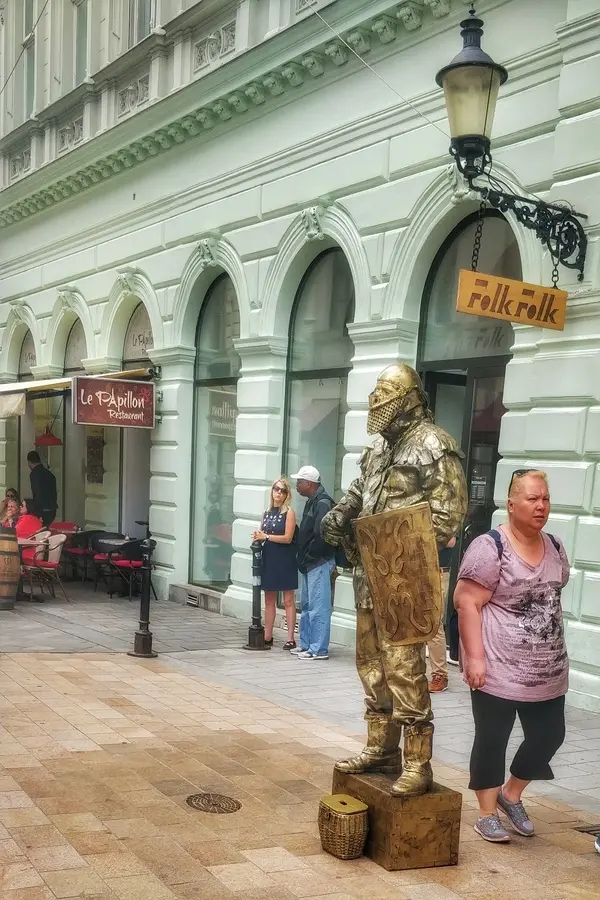 A man bronze painted pretending to be a statue in Bratislava
