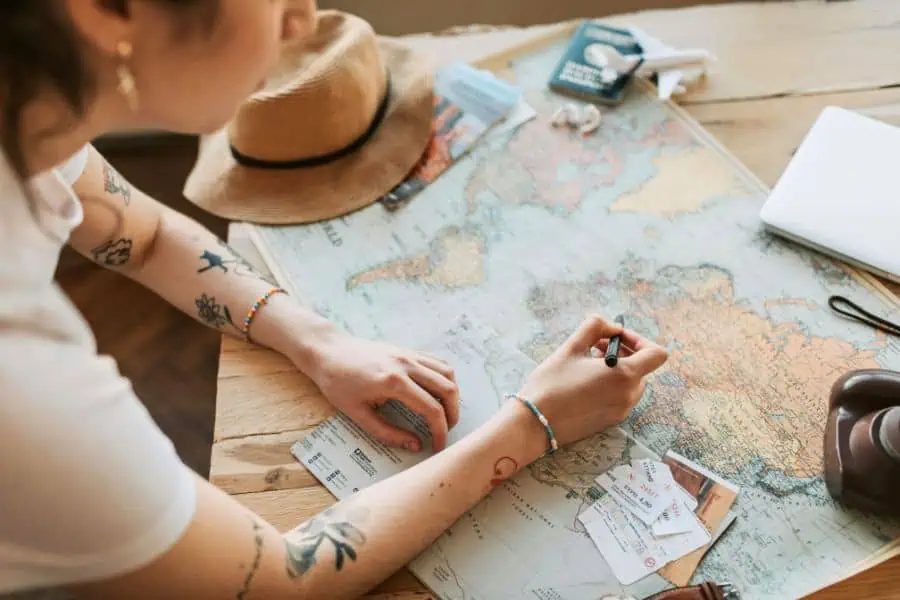 woman mapping a travel plan